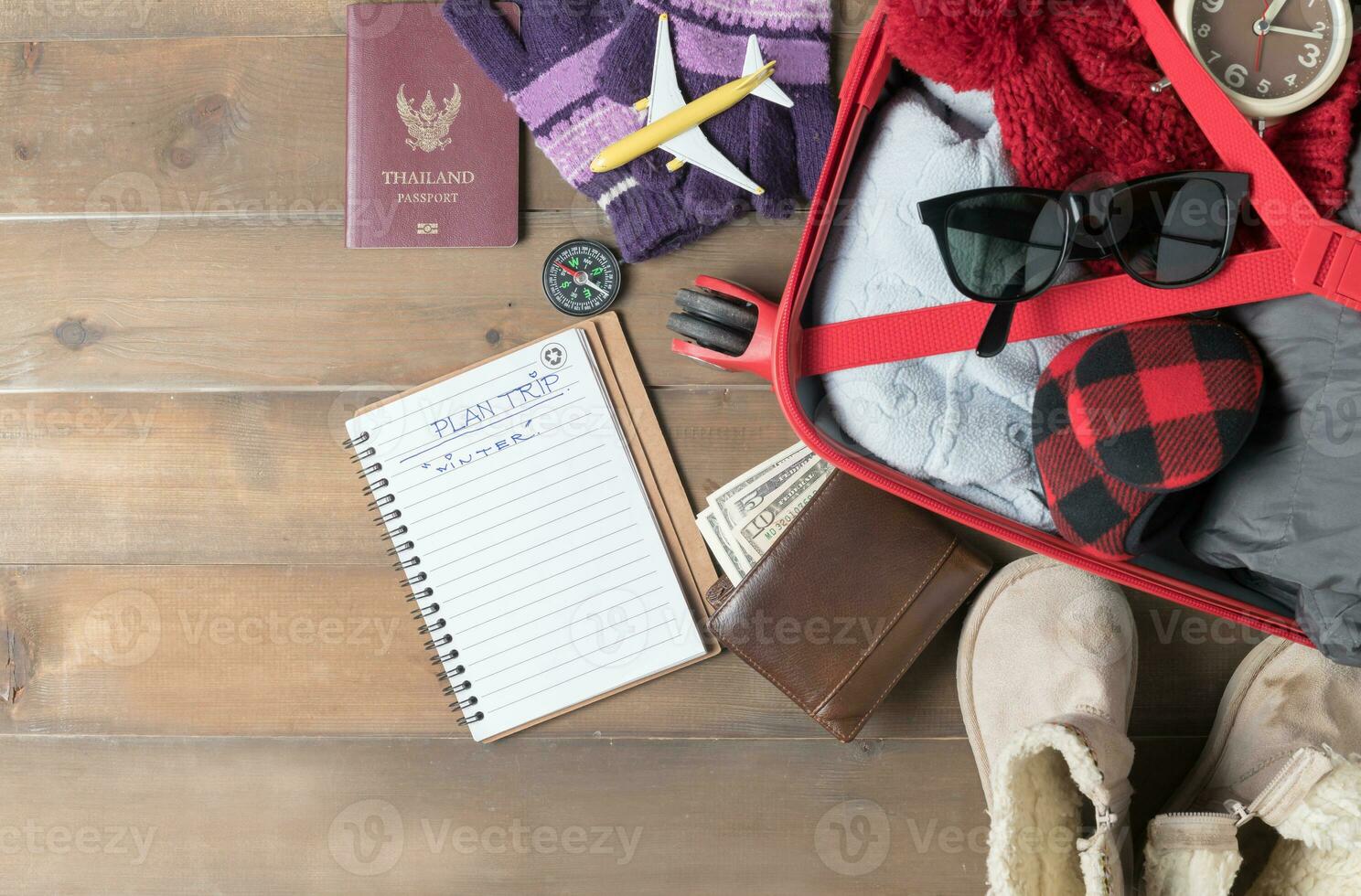 prepare accessories and travel items for winter trip photo
