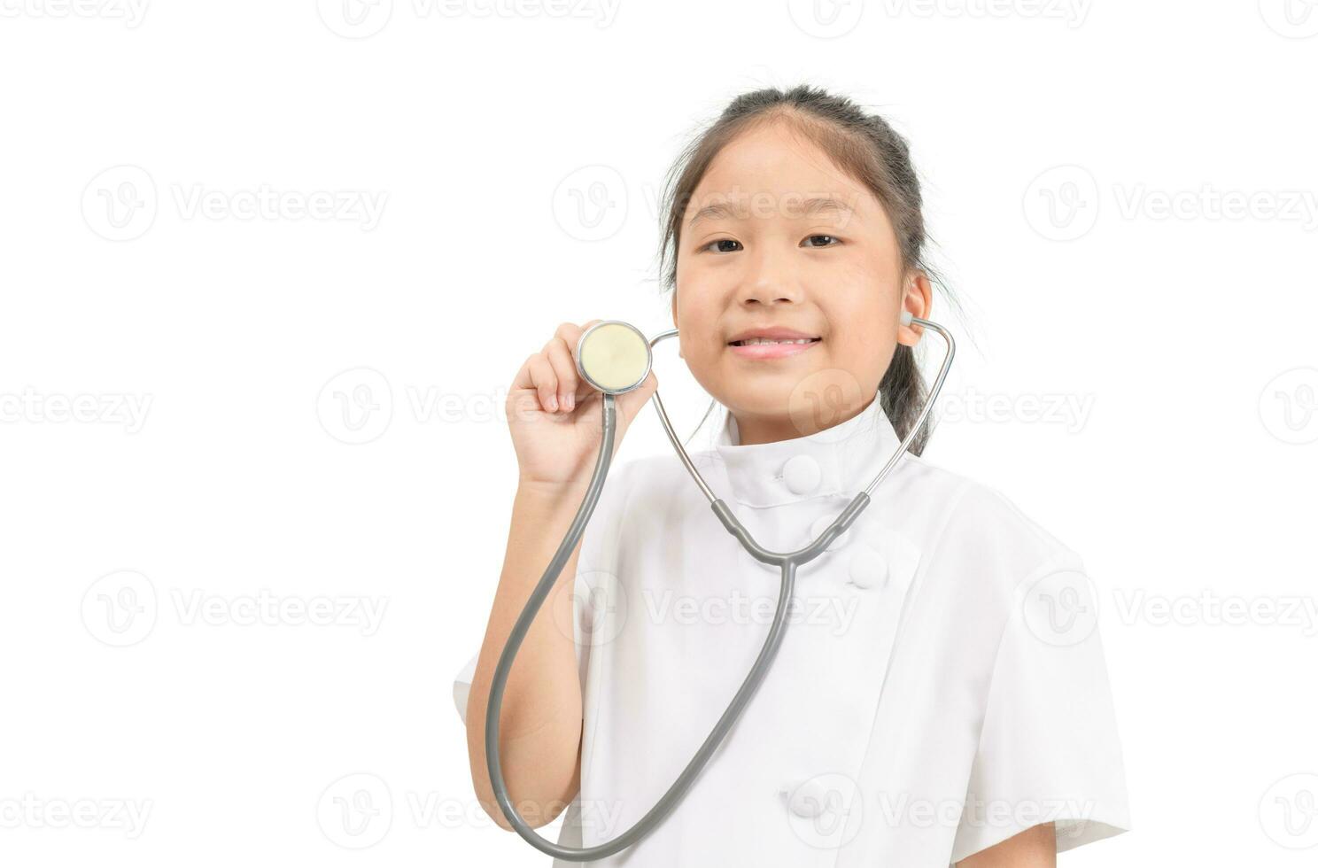 Cute asian child in doctor coat holding stethoscope isolated photo