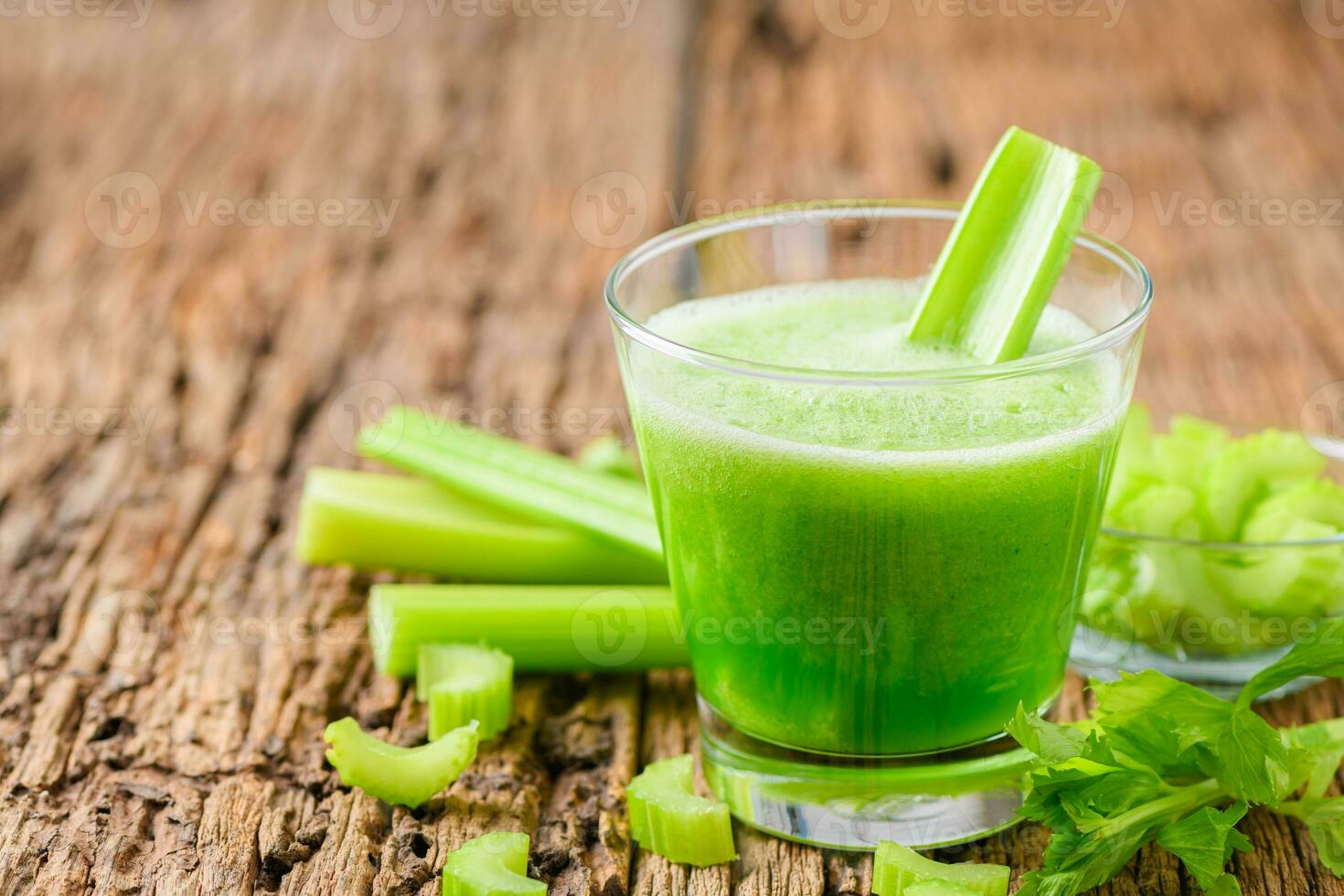 Fresh green celery juice in glass photo