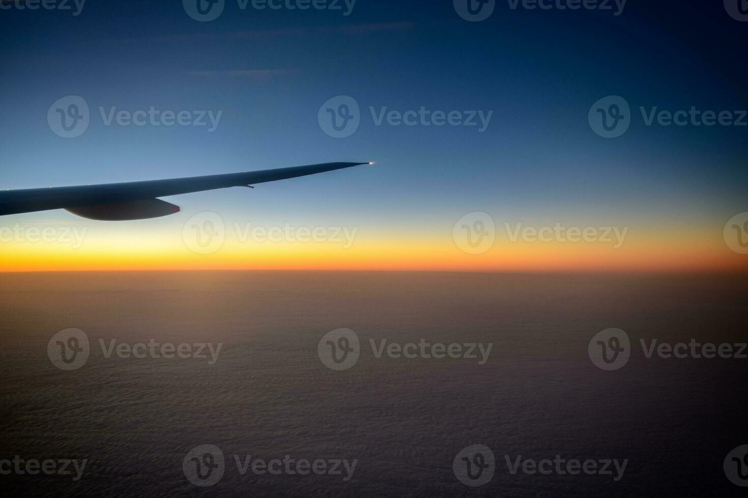 Beautiful sky in  evening from window airplane photo