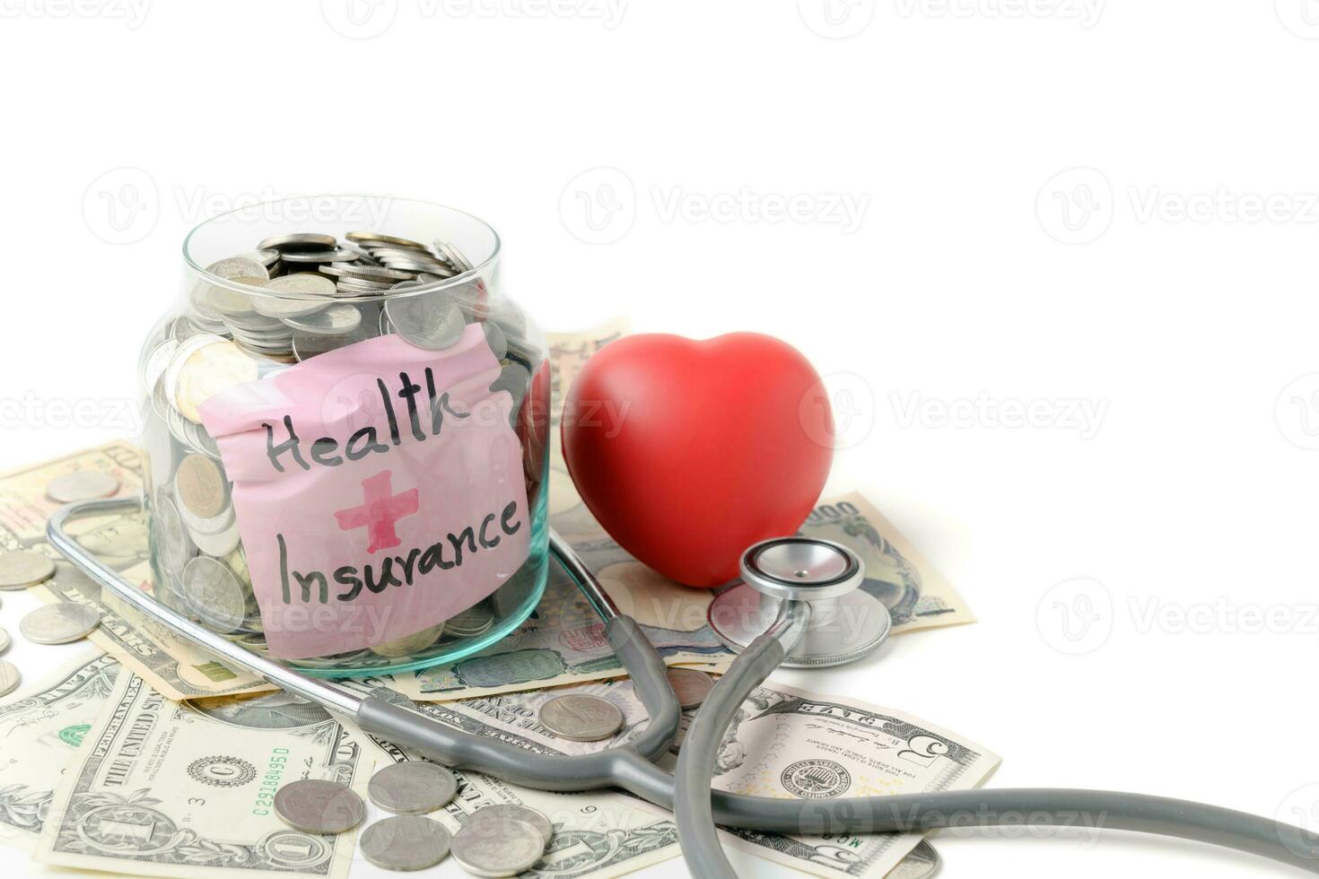 Coins in jar with stethoscope and banknote background photo