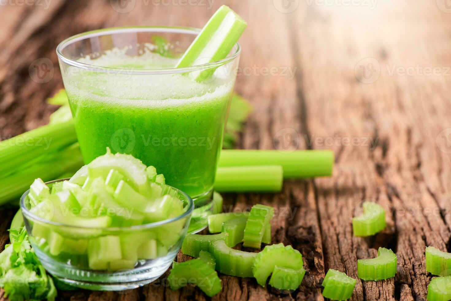 Fresh green celery juice in glass photo