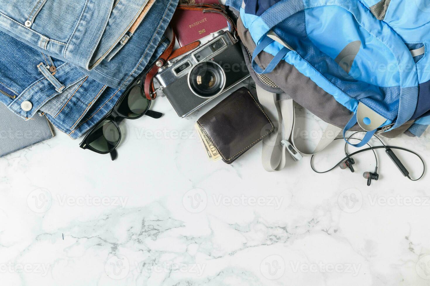 prepare backpack accessories and travel items photo
