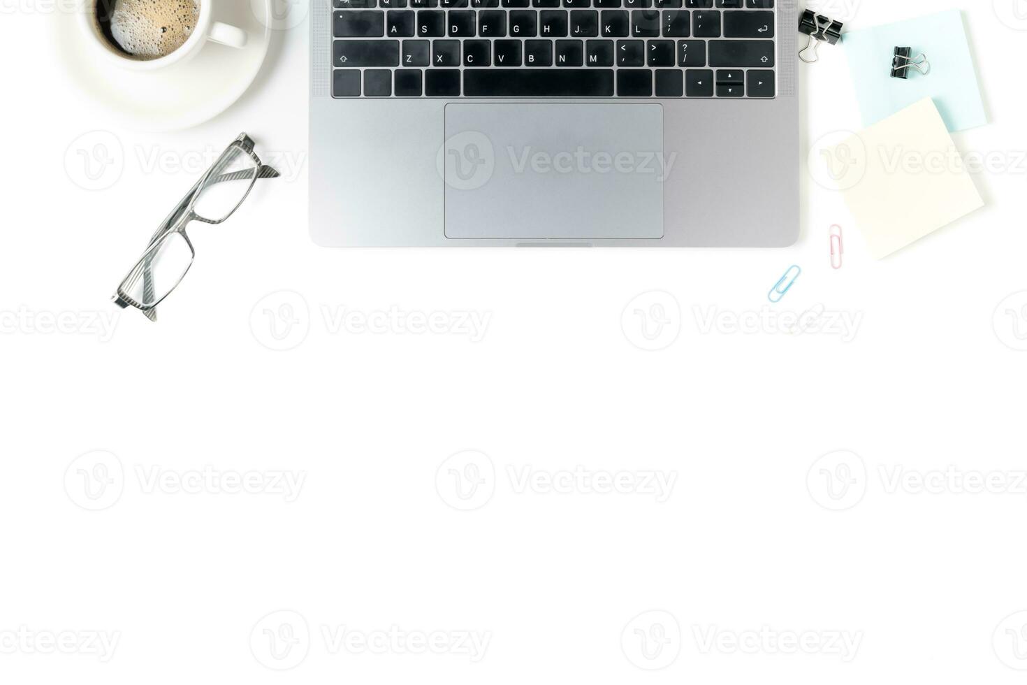 Modern workspace with coffee cup, smartphone, paper photo