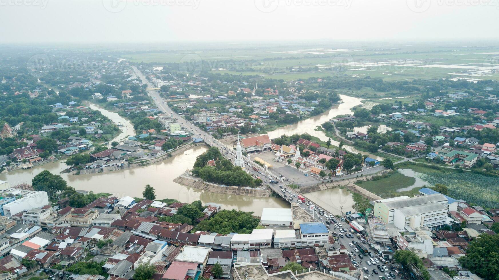 old pagoda with temple near river in Lop Buri photo