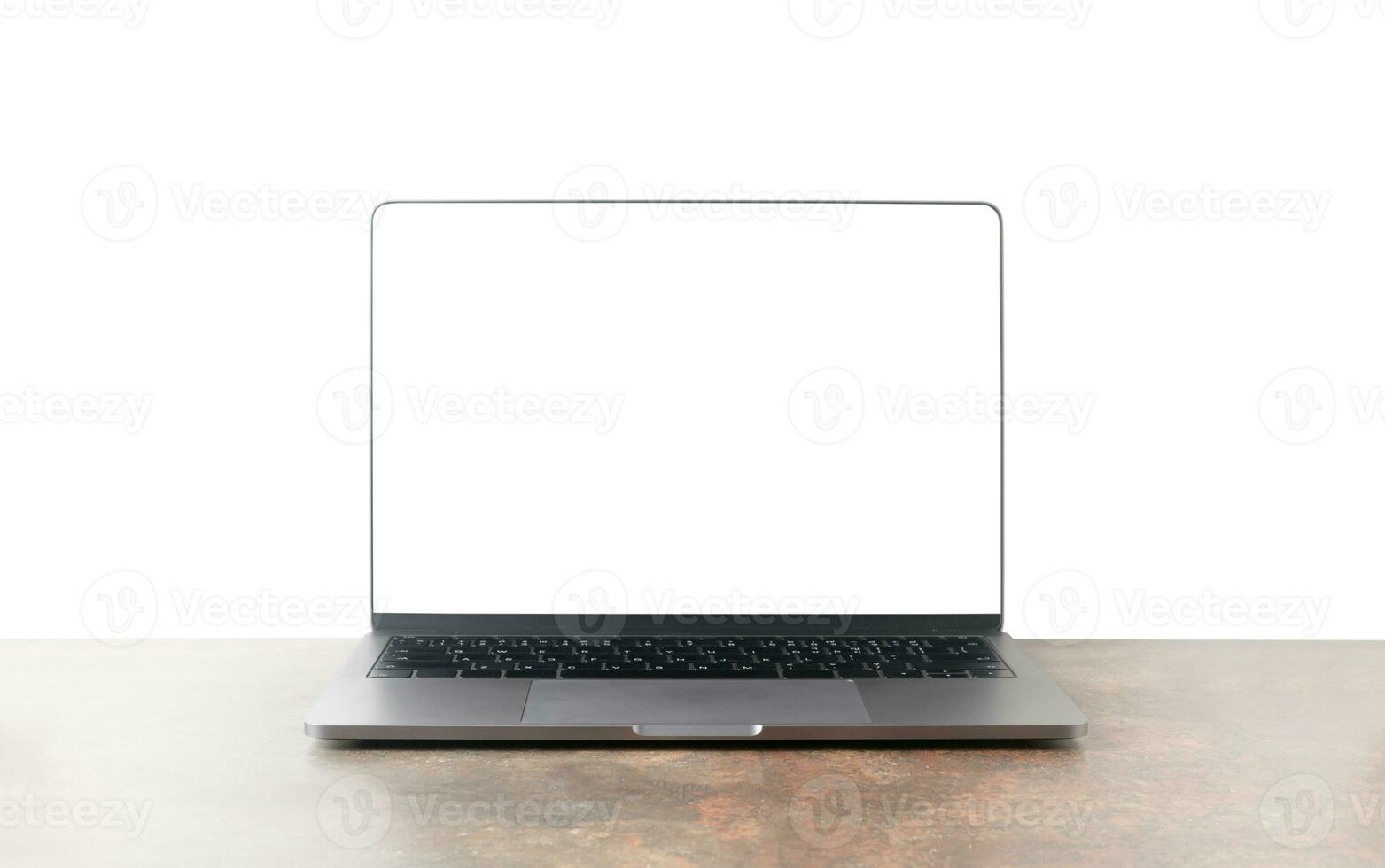 Front view of the laptop is on the work table photo