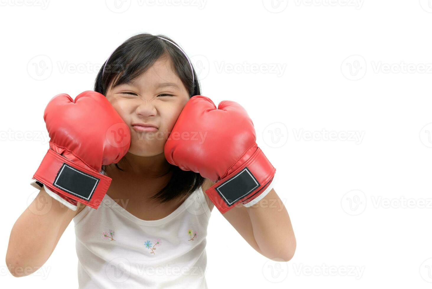 Cute girl fighting with red boxing gloves photo
