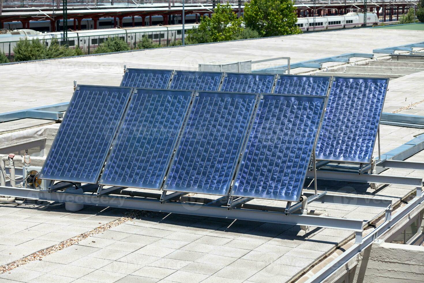 Solar panels on the top of a building photo