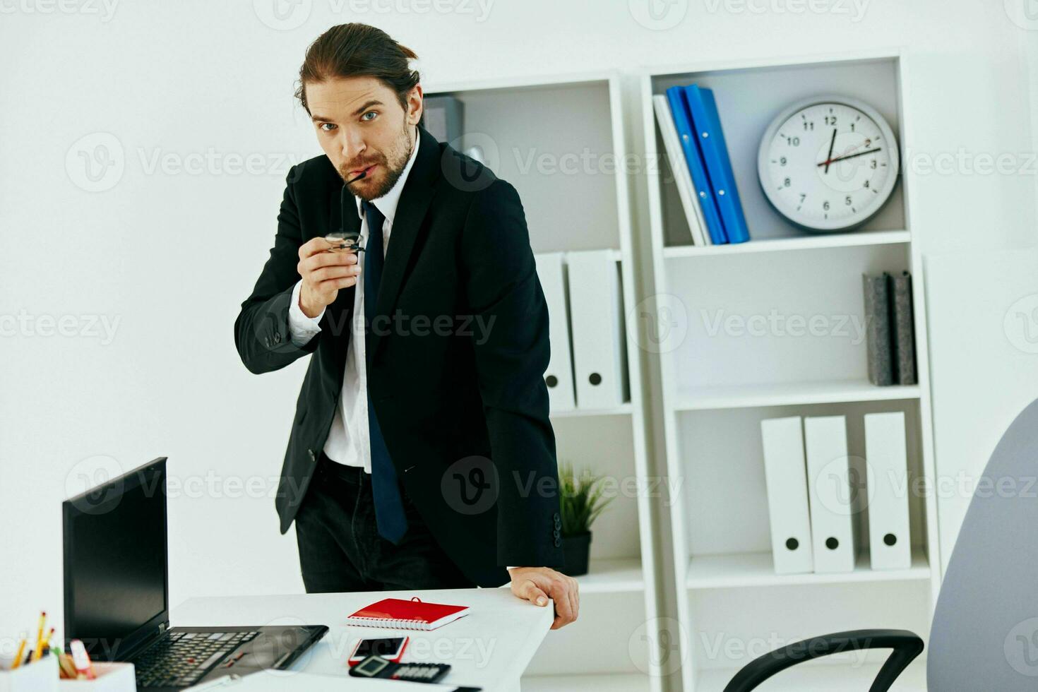 manager holding a phone telephone office technologies photo