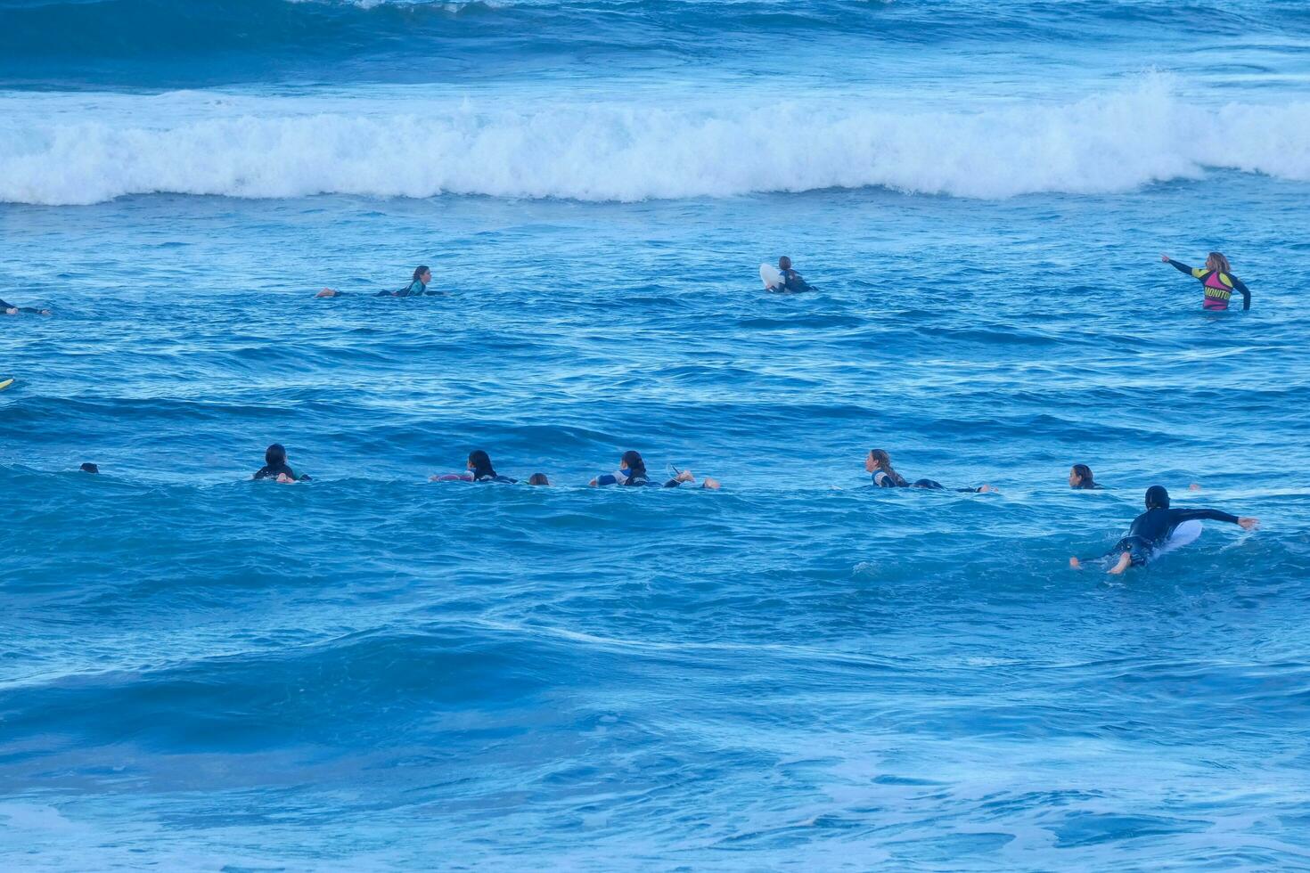 Surf school on an ocean beach photo