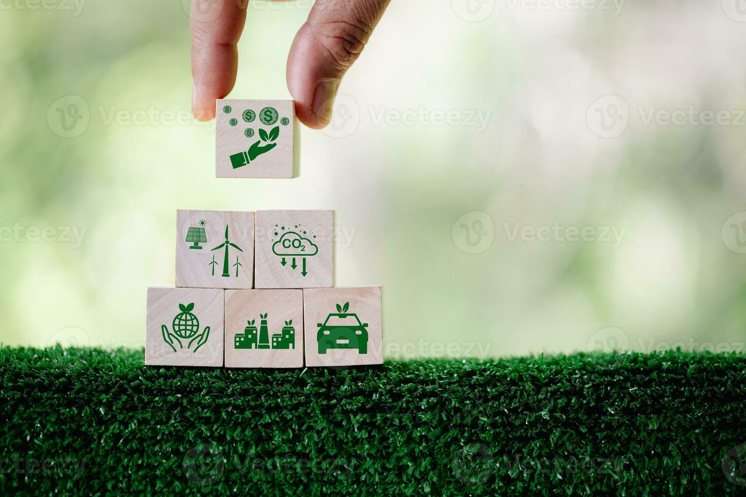 Companies are targeting net zero greenhouse gas emissions. Carbon credit concept.Tradable certificate to drive industry in direction of low emissions in efficiency cost. Wooden cubes with decrease CO2 photo