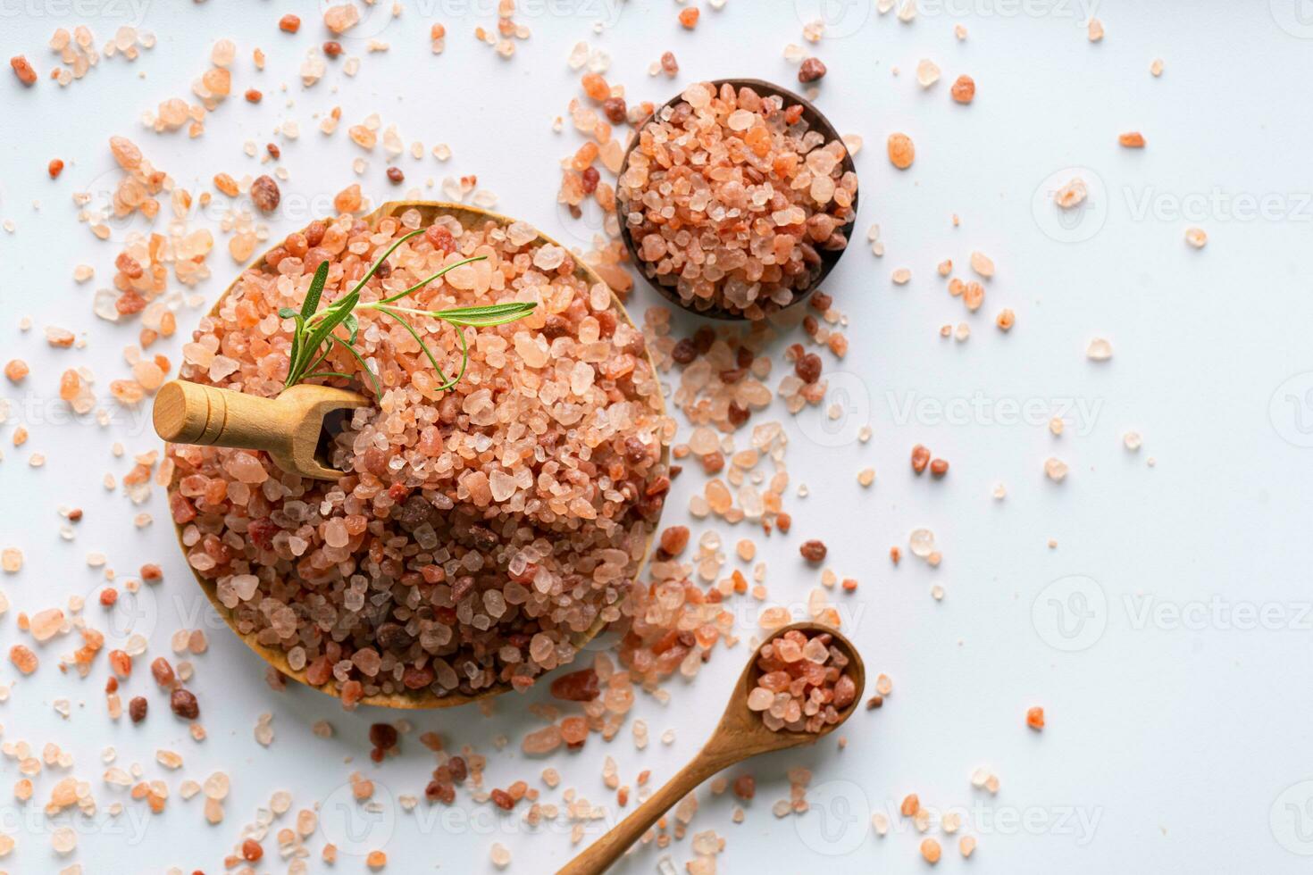 Himalayan pink salt is herb seasoning from himalaya and isolated on white background with copy space photo
