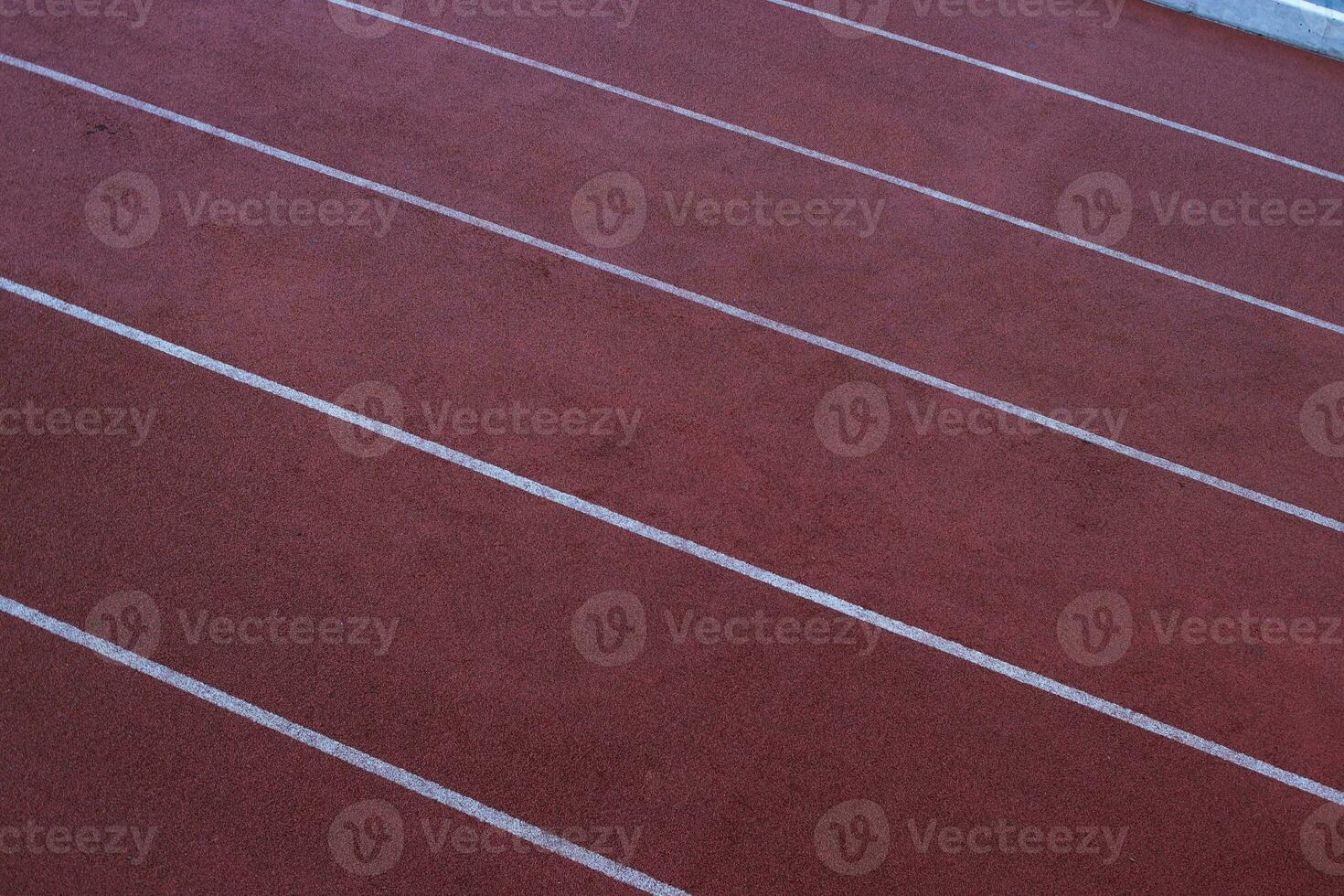 corriendo pista en un estadio foto