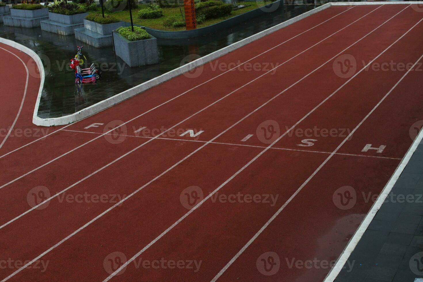 Finish line on running track photo
