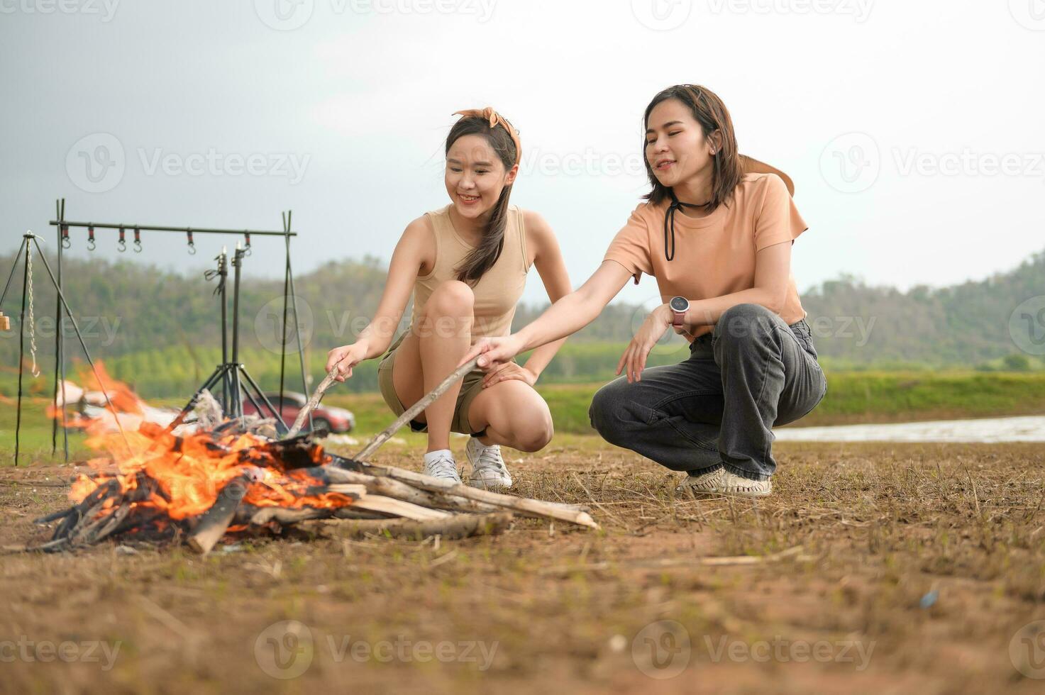 young pretty Asian woman  enjoy camping photo