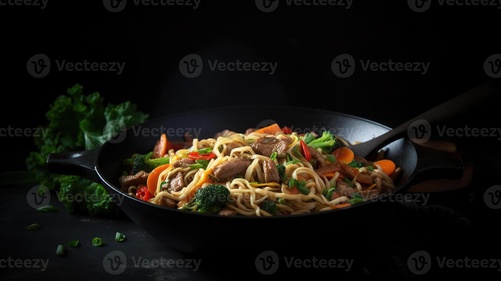 Stir fry noodles with vegetables and beef in black bowl. Slate background. Copy space. photo