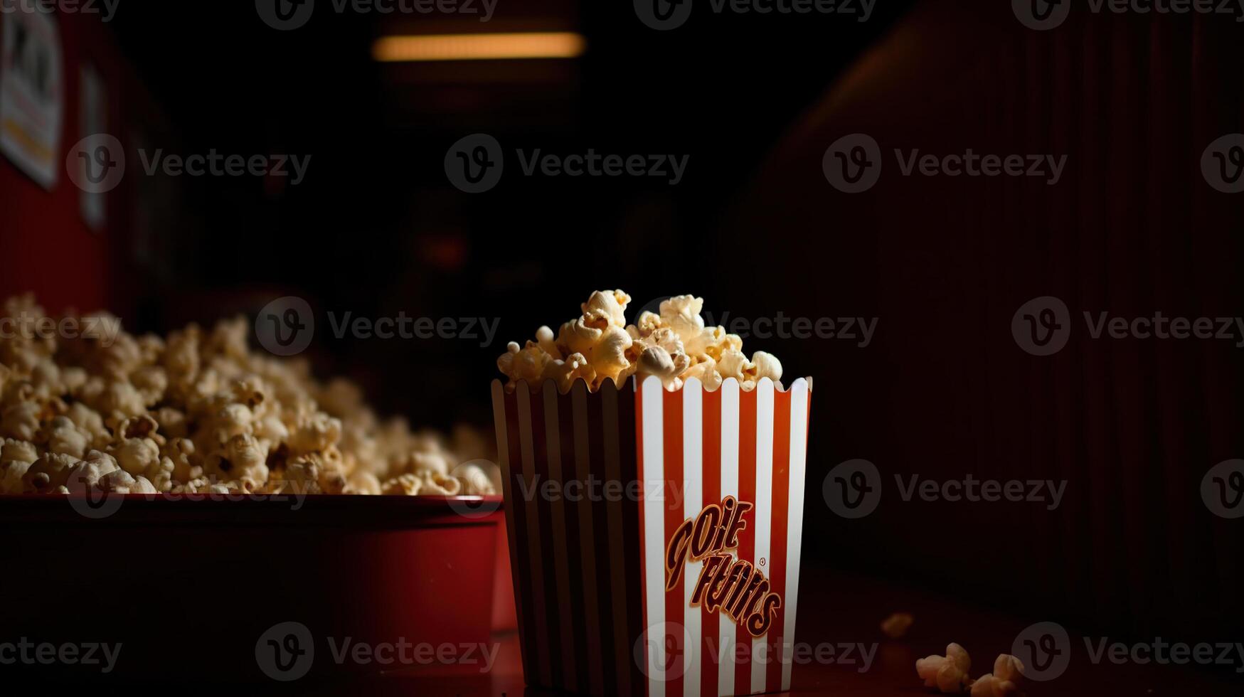 Popcorn in a striped box. Movie eating in theater, photo