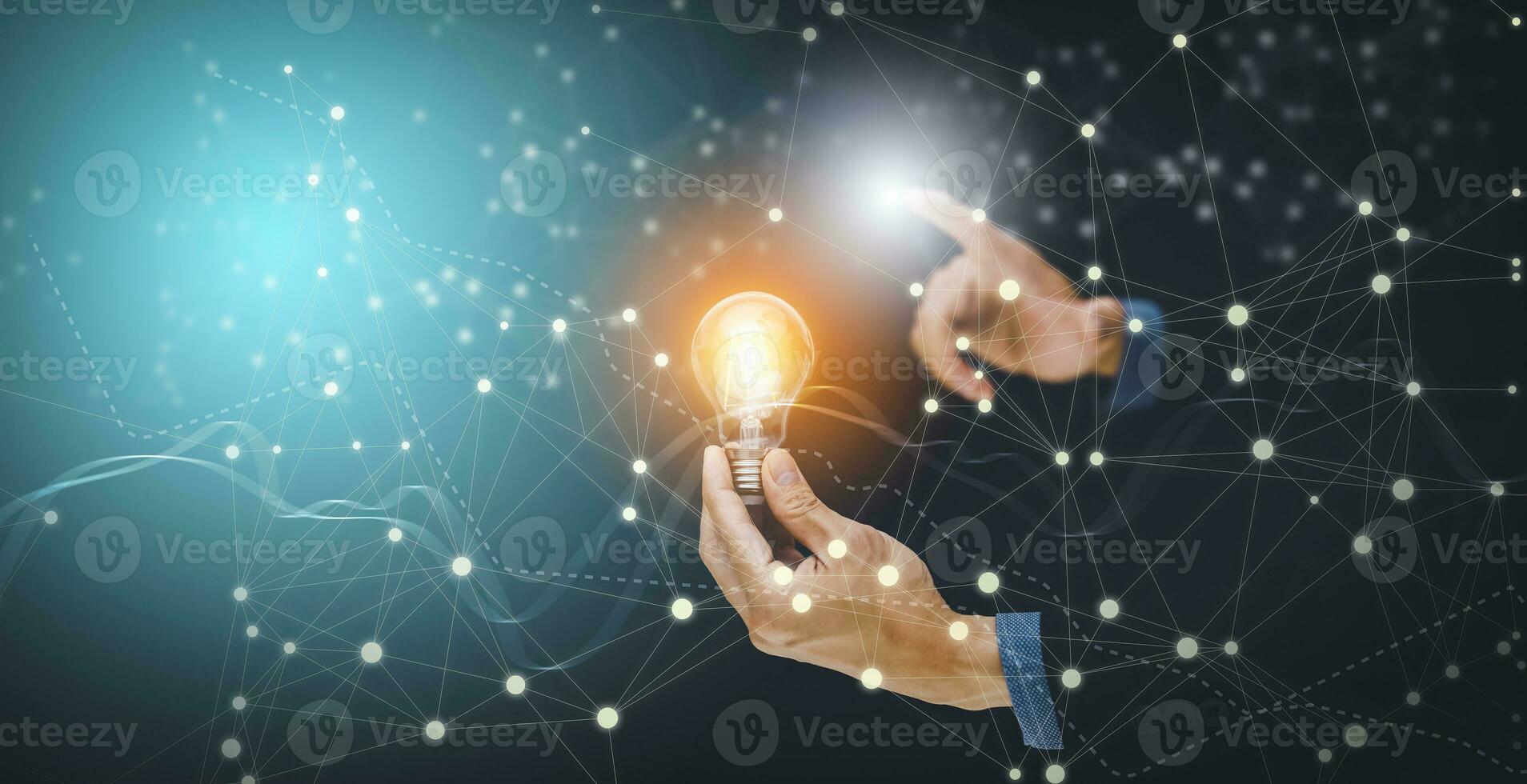 The Man hand holding light bulb with line connect and working on the desk, Creativity and innovation are keys to success.Concept of new idea and innovation with energy and power , working at home, photo