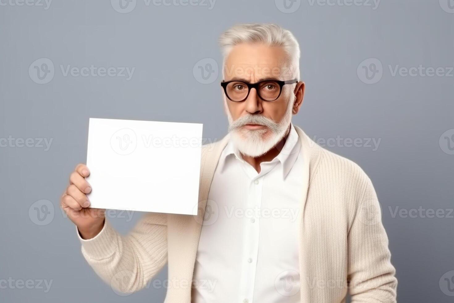 A man holds a blank white sign board mockup in his hand photo