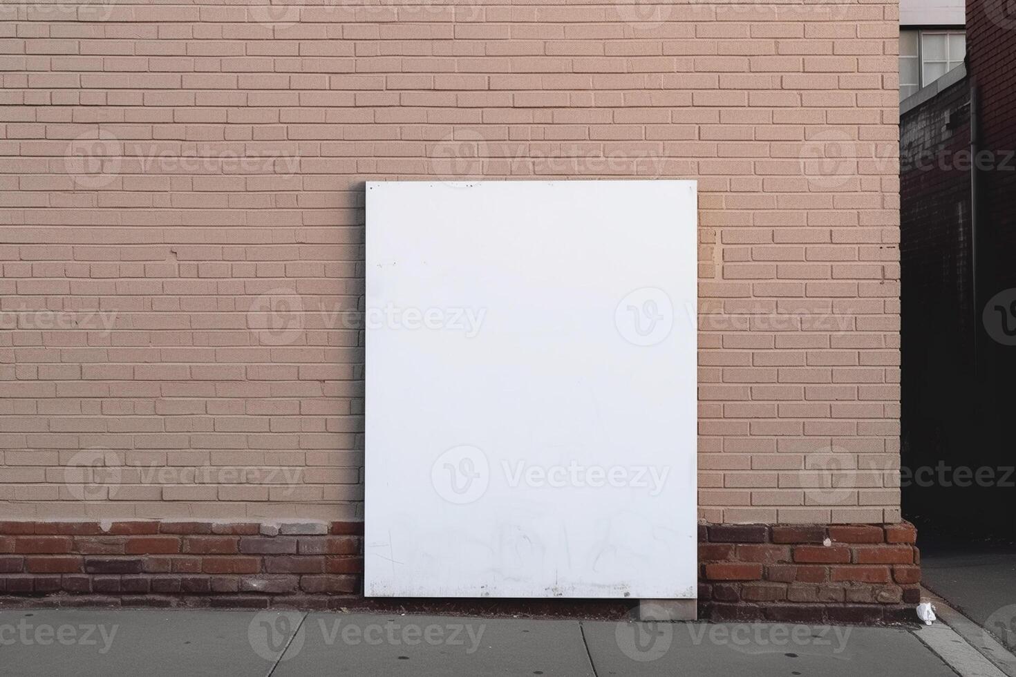 A blank white billboard mockup on a sidewalk in a city photo