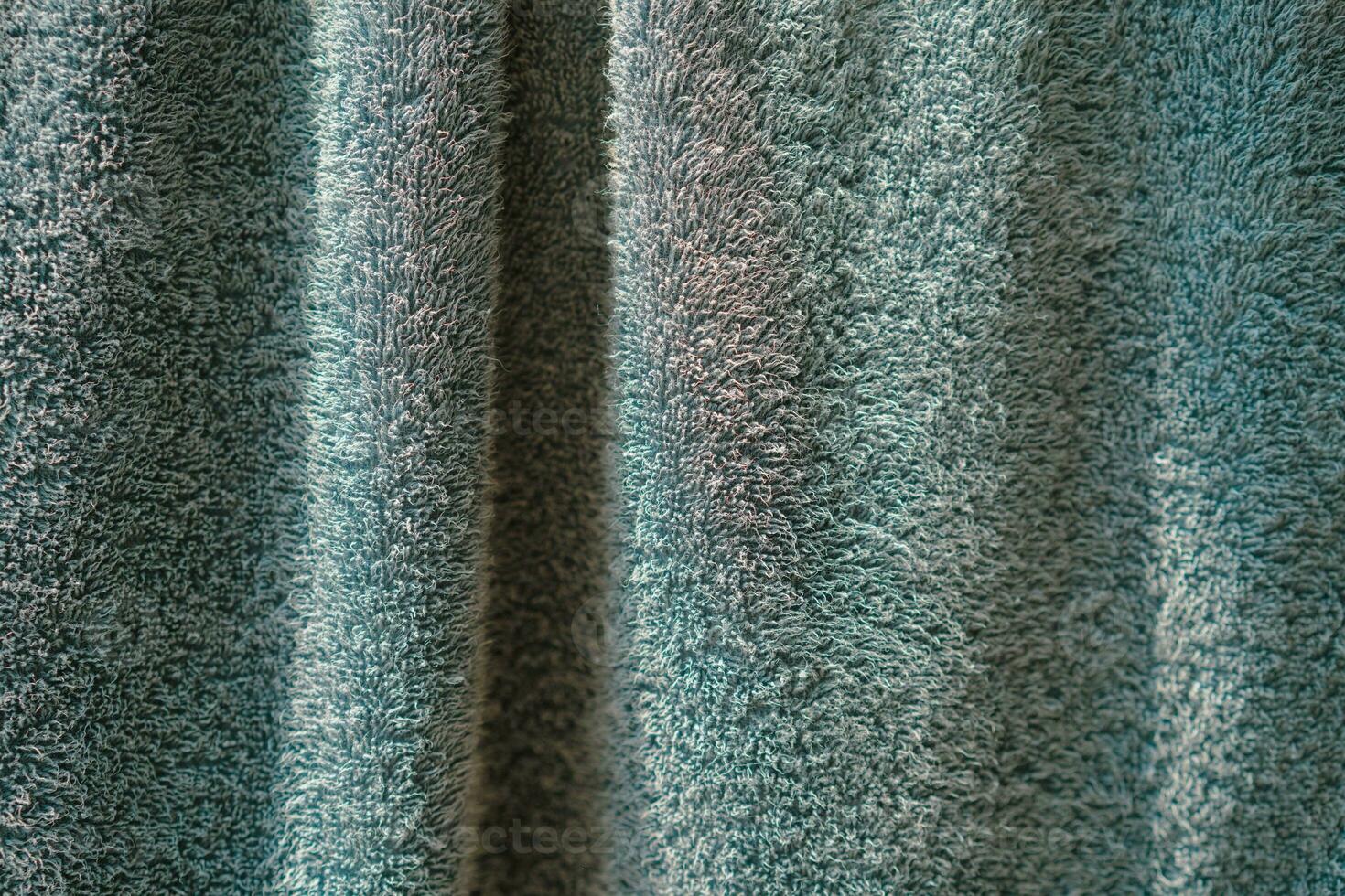close up of blue towel texture for background and textured surface. photo