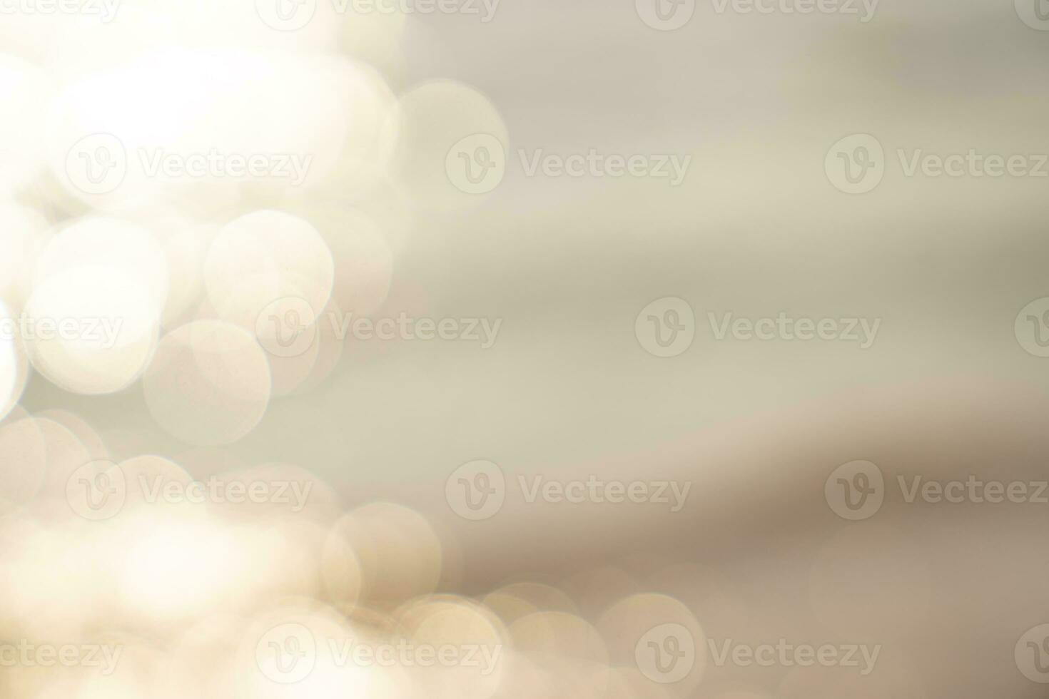 Abstract blurred bokeh background of sea and sand for design. photo