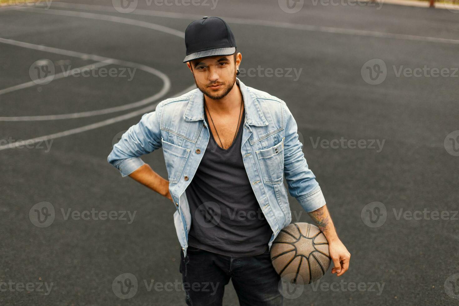 Hipster man with ball photo