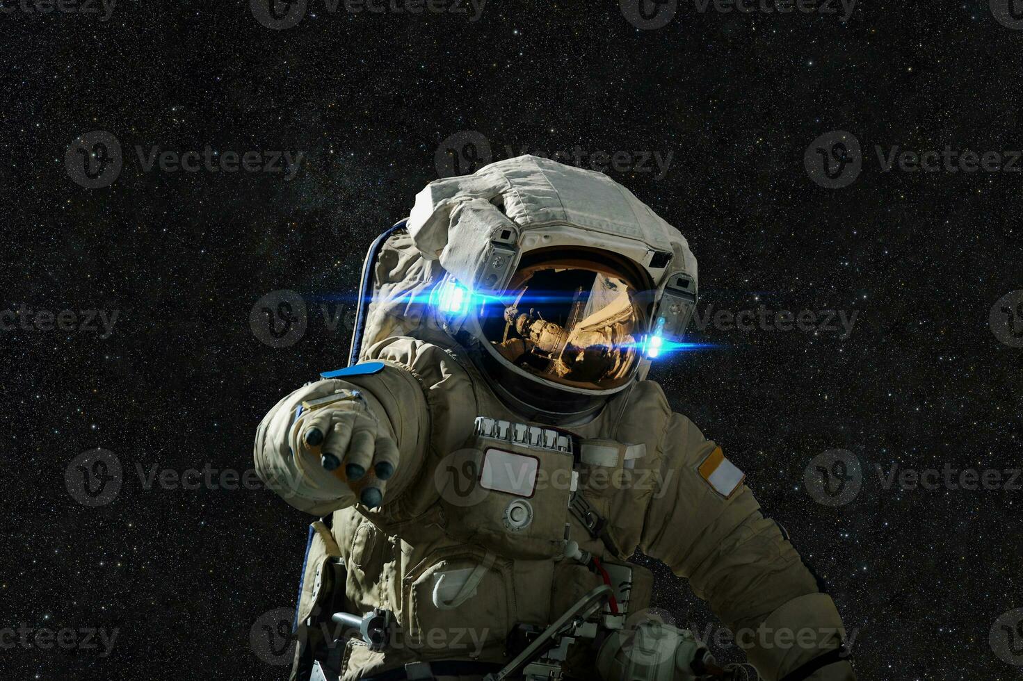 Spaceman in space on the background of stars. photo