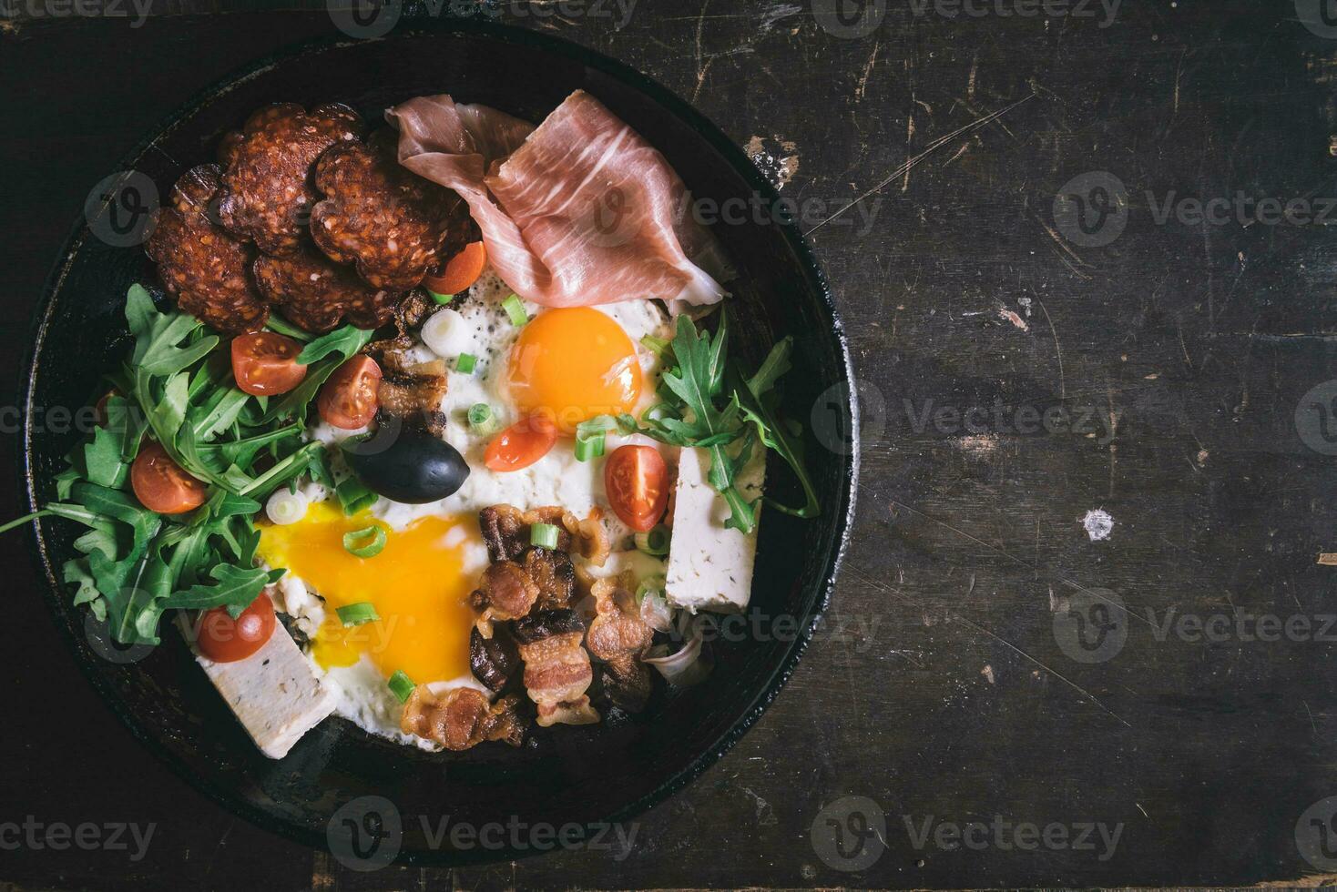 Served breakfast in pan photo