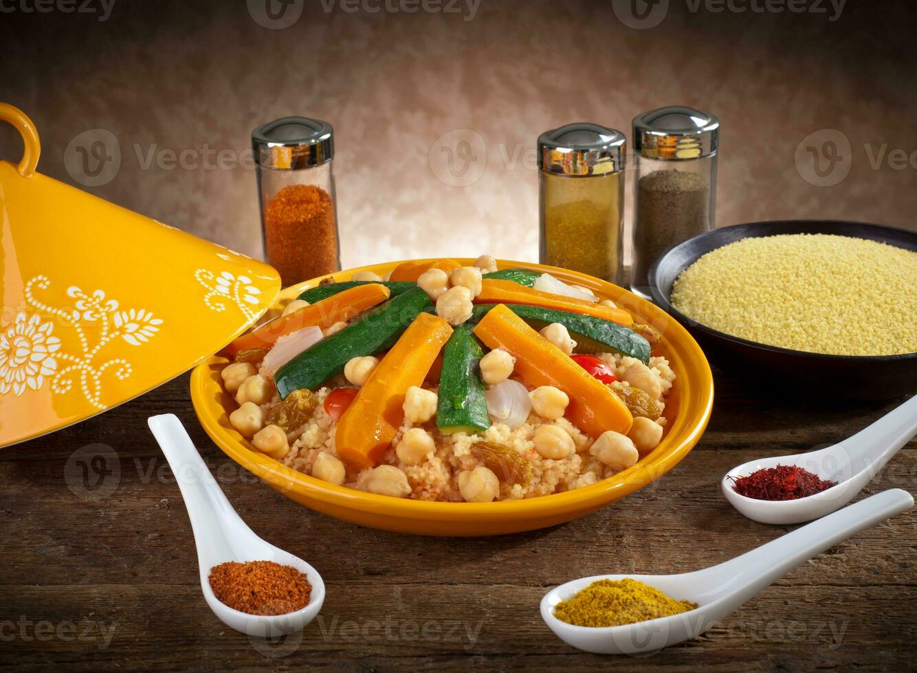 Vegetable tagine with cous cous and spices 23341110 Stock Photo at Vecteezy