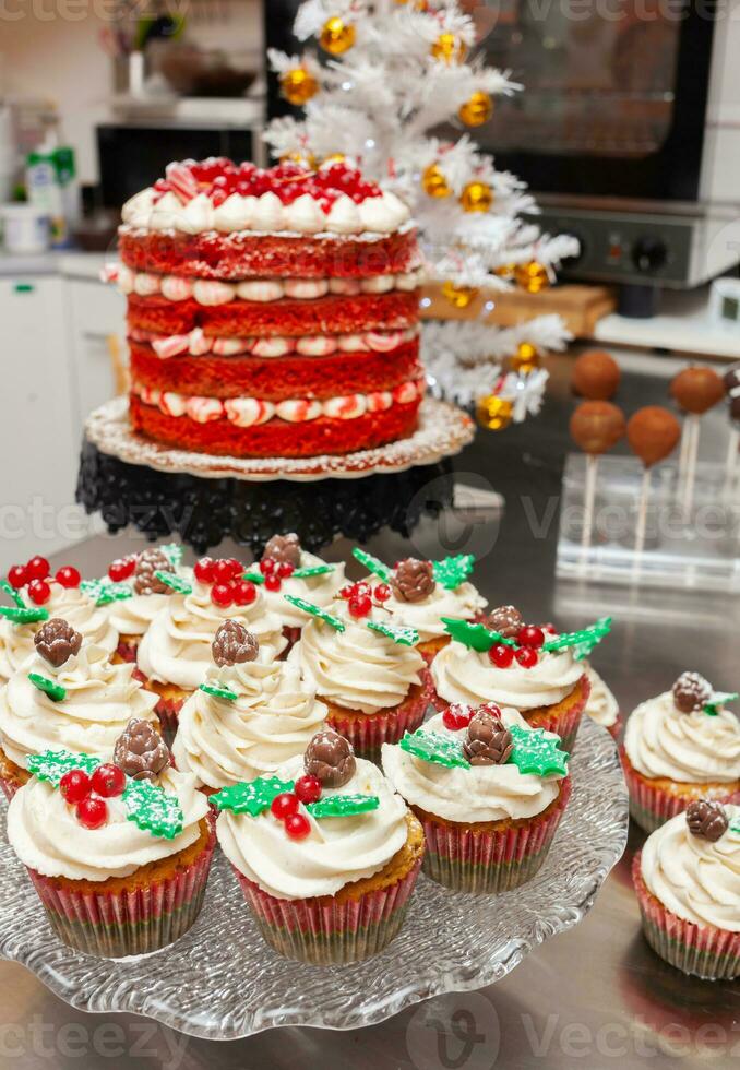 Red velvet cake and gingerbread cupcake. photo