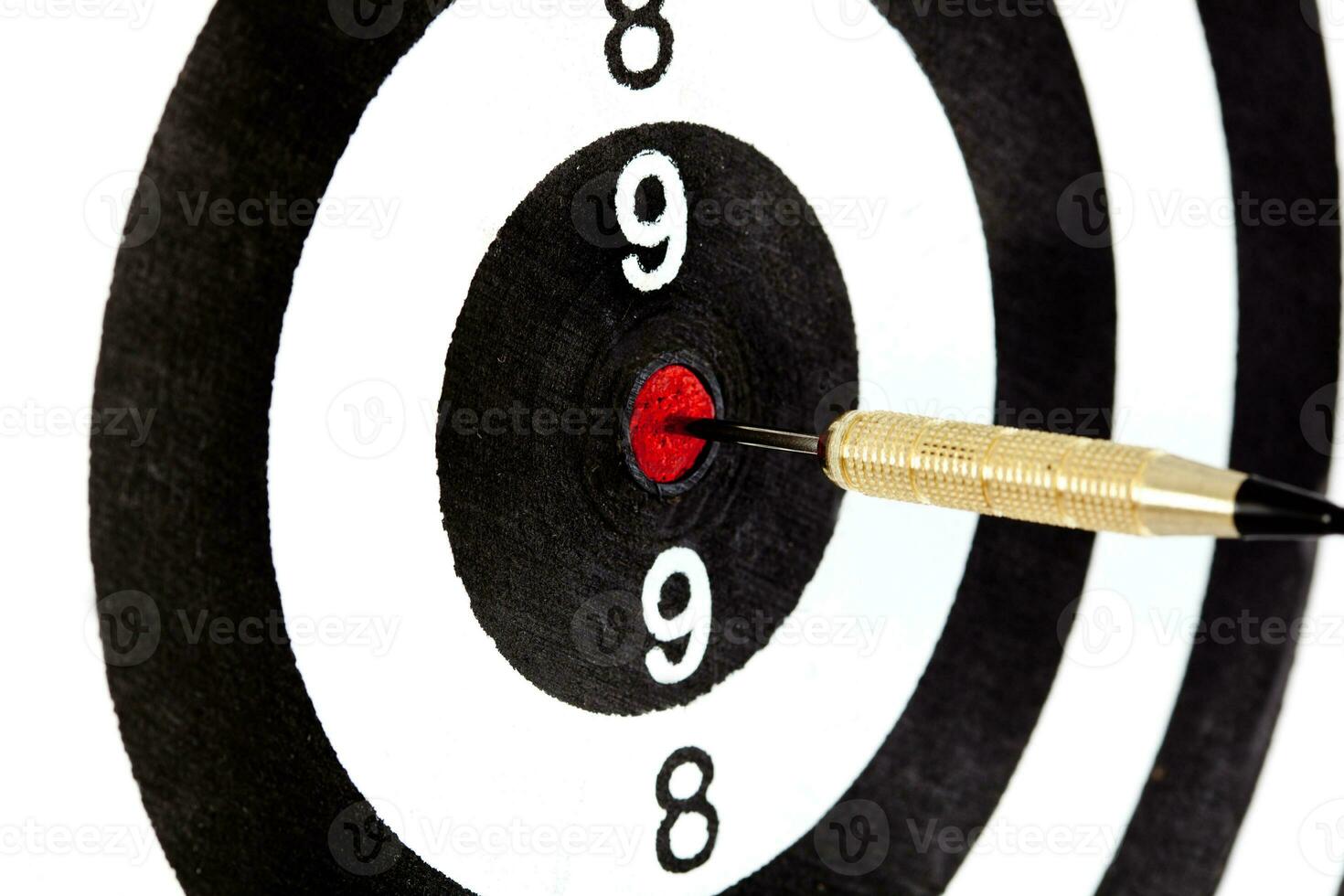 Bulls eye target with dart photo