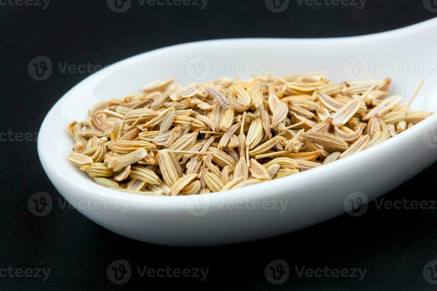 Fennel seeds in the spoon photo