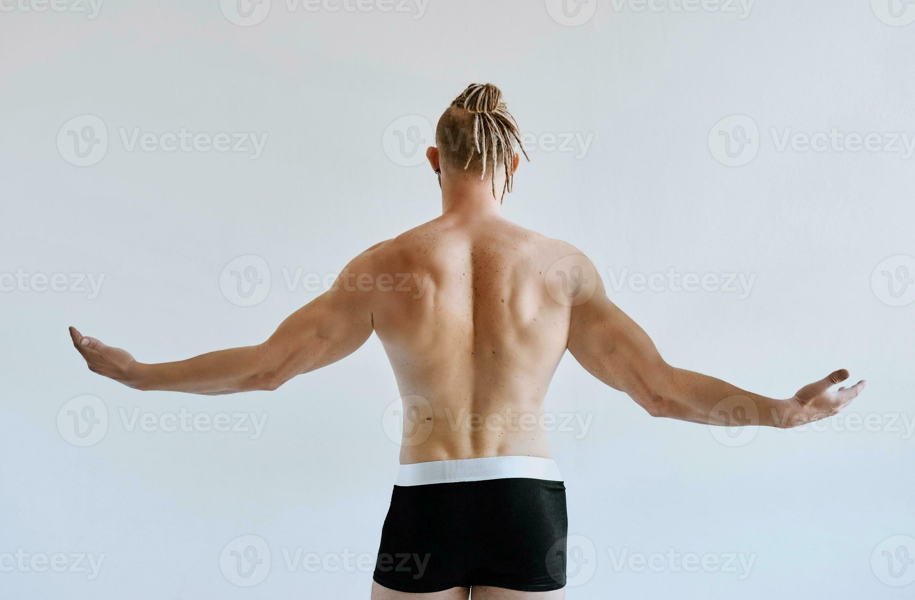 Handsome caucasian athletic young man in underwear. Fitness, bodybilding  23349030 Stock Photo at Vecteezy