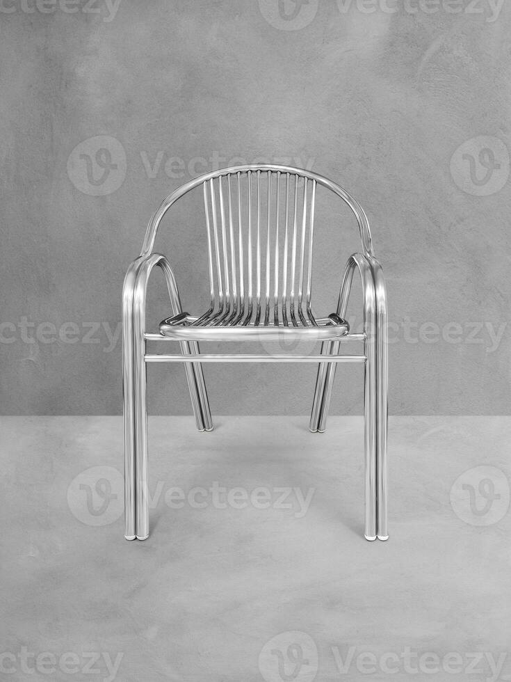 Modern style stainless steel chair for sitting isolated on cement background. photo