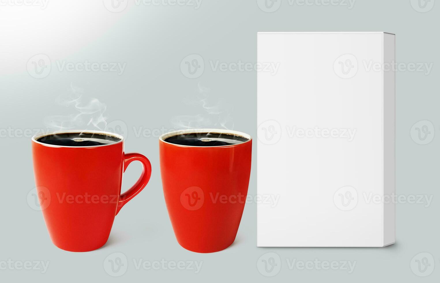 red coffee mug with empty packaging box mockup isolated on gray background photo