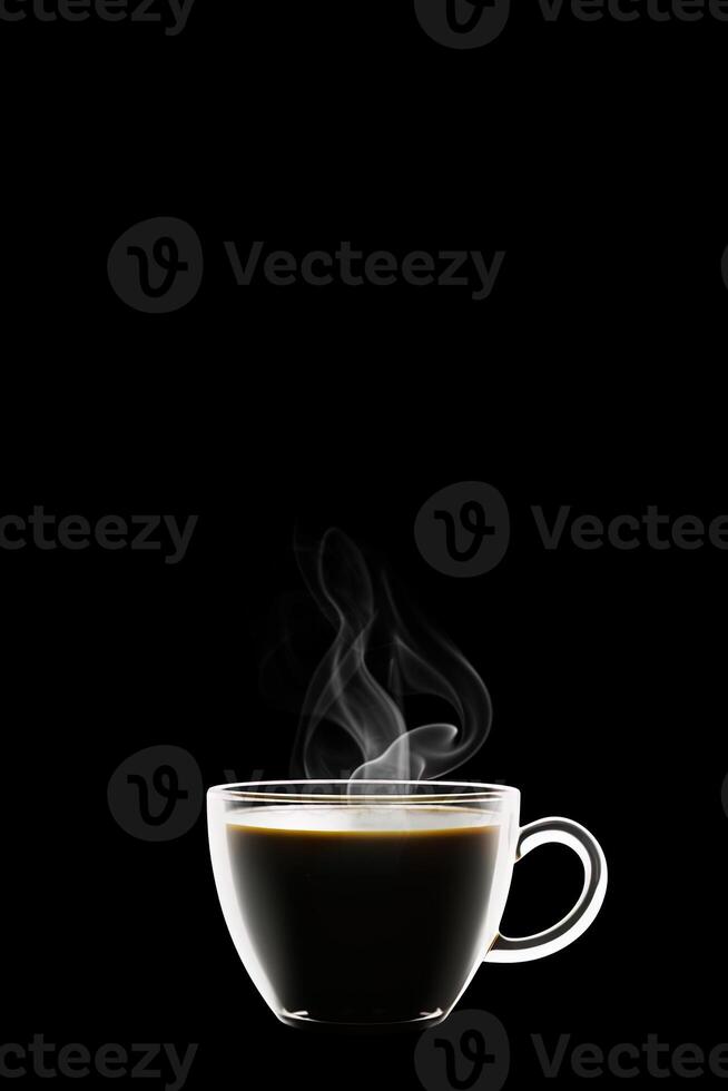 Close up a cup of a black hot coffee with smoke on black background with copy space. photo