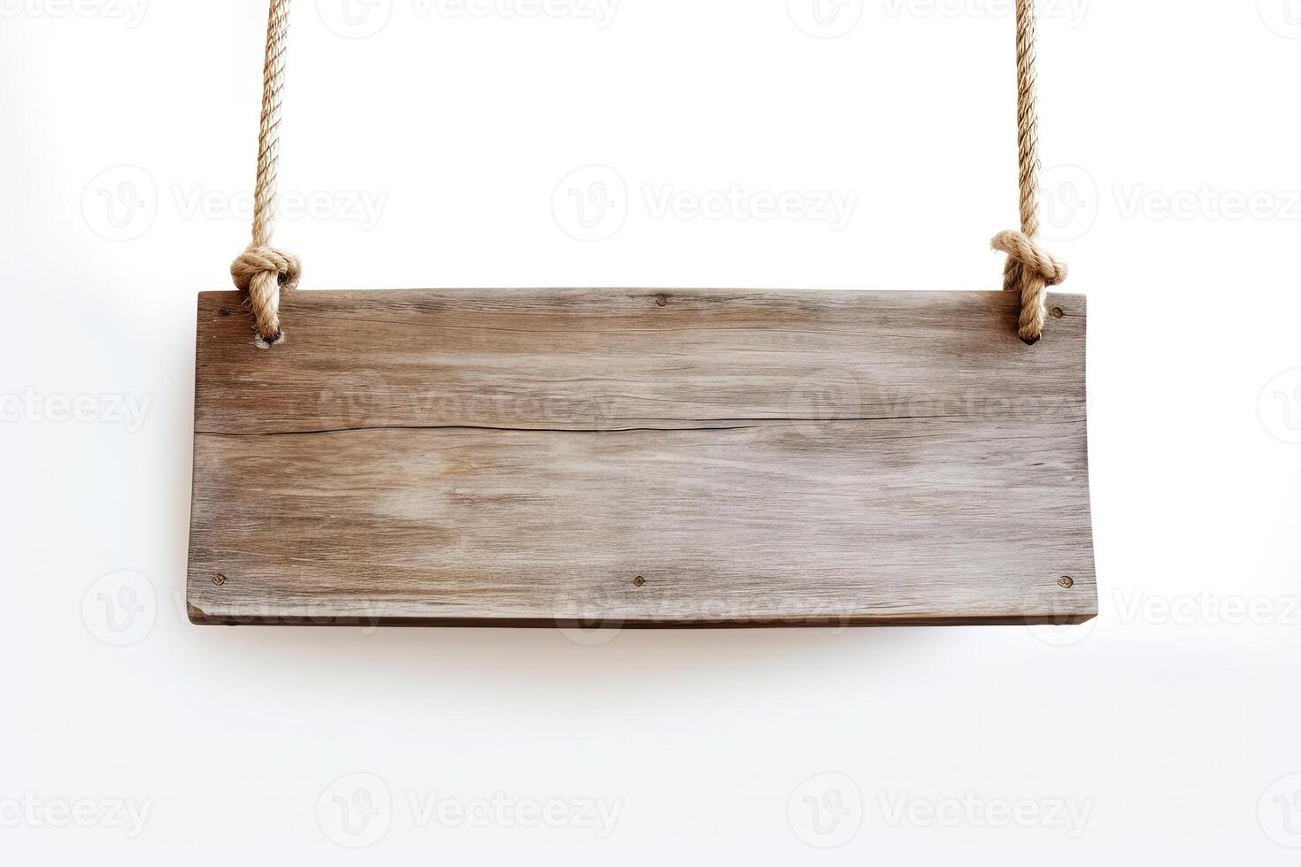 Wooden sign plain hanging from rope isolated on white background. photo