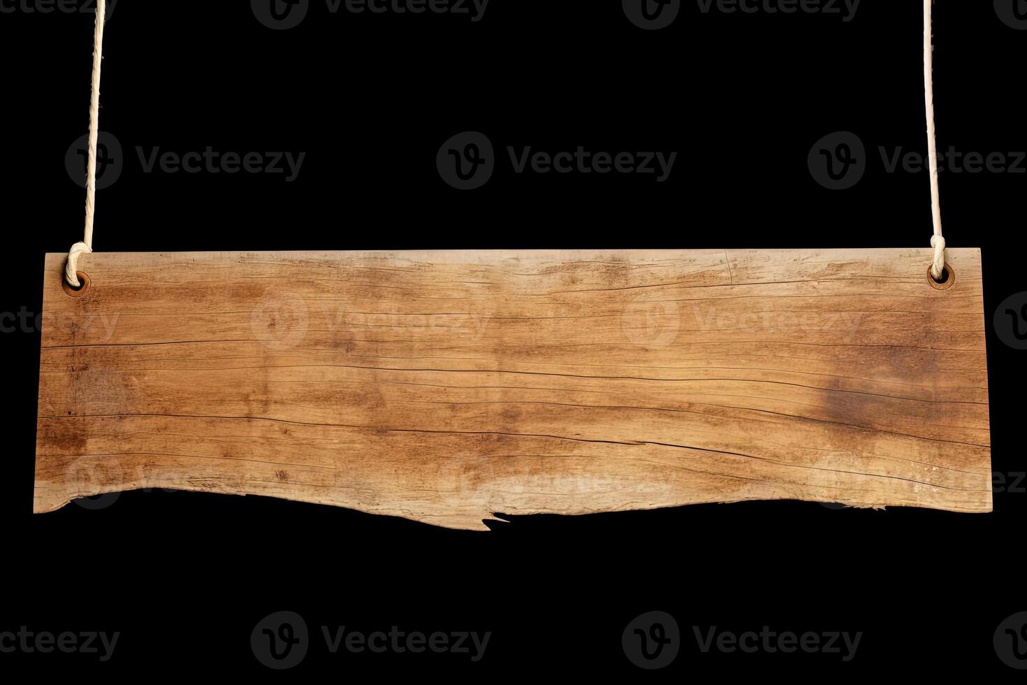 Wooden sign plain hanging from rope isolated on black background. photo