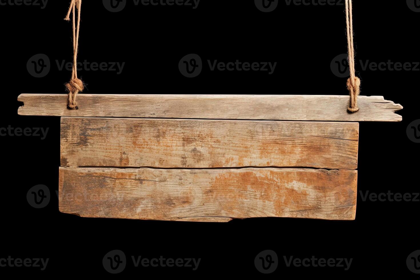 Wooden sign plain hanging from rope isolated on black background. photo