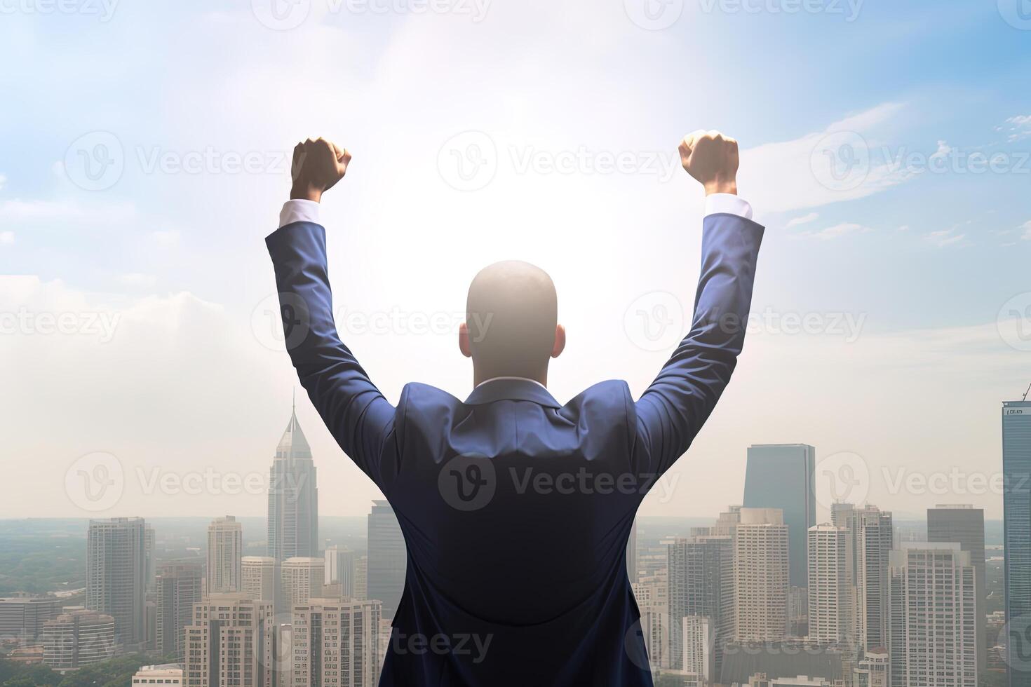 Successful businessman raising hand and expressing positivity while standing against skyscrapers background. photo