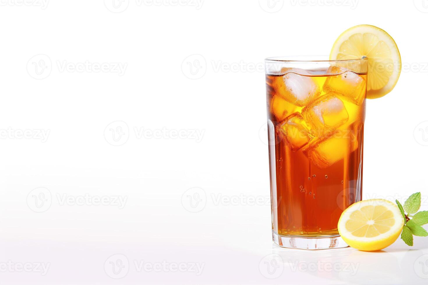 a glass of iced lemon tea with a slice of lemon isolated on white background with copy space. photo