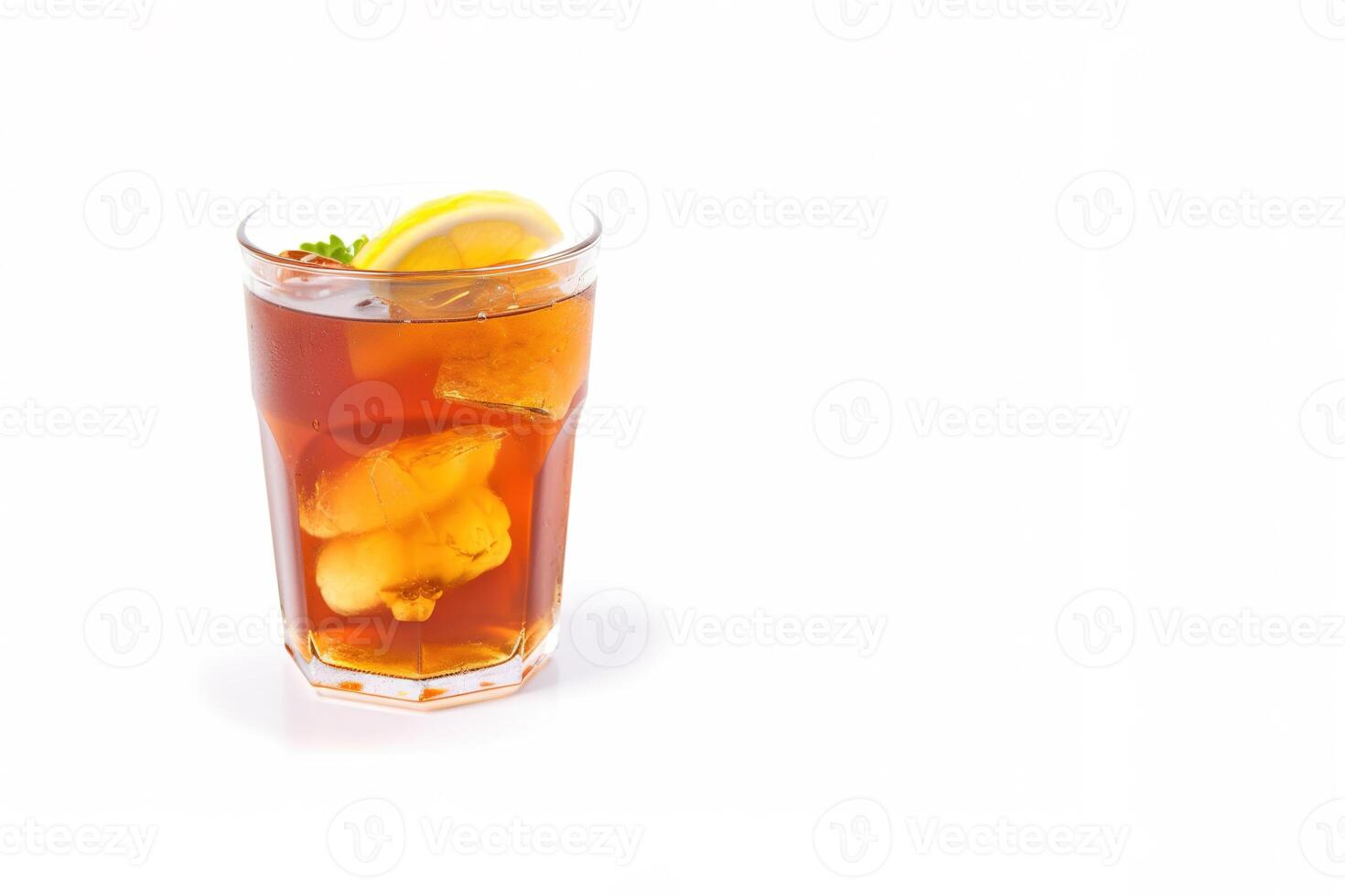 a glass of iced lemon tea with a slice of lemon isolated on white background with copy space. photo