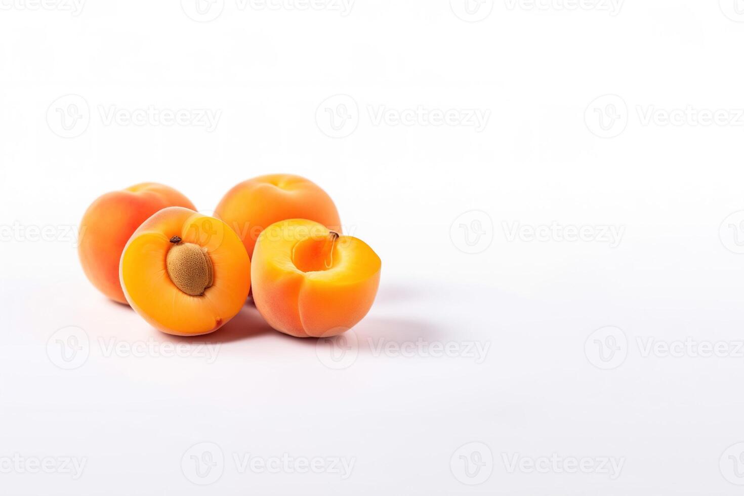 Fresh whole and sliced peaches apricots isolated on white background with copy space. photo