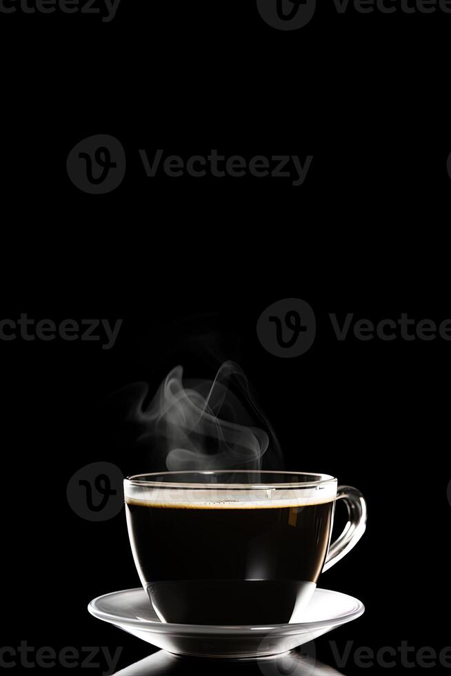 Close up a cup of a black hot coffee with smoke on black background with copy space. photo