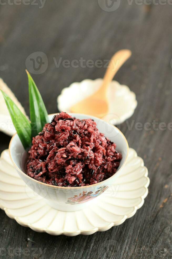 Tape Ketan Hitam. Fermented Black Glutinous Rice photo