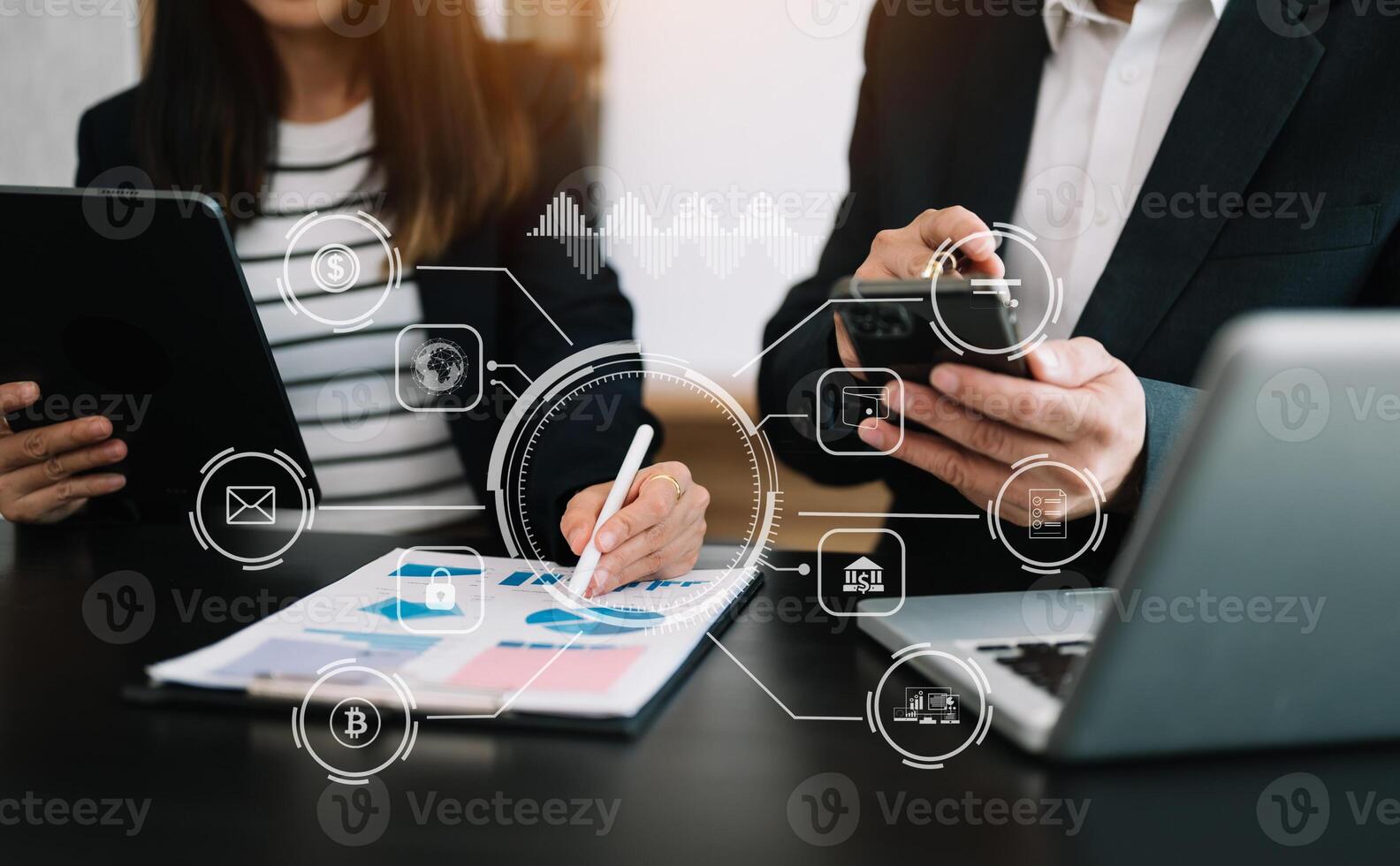 Business team partnership meeting concept. Business hand using laptop, tablet and smartphone  in office. Digital marketing media mobile app in virtual icon screen in morning light photo