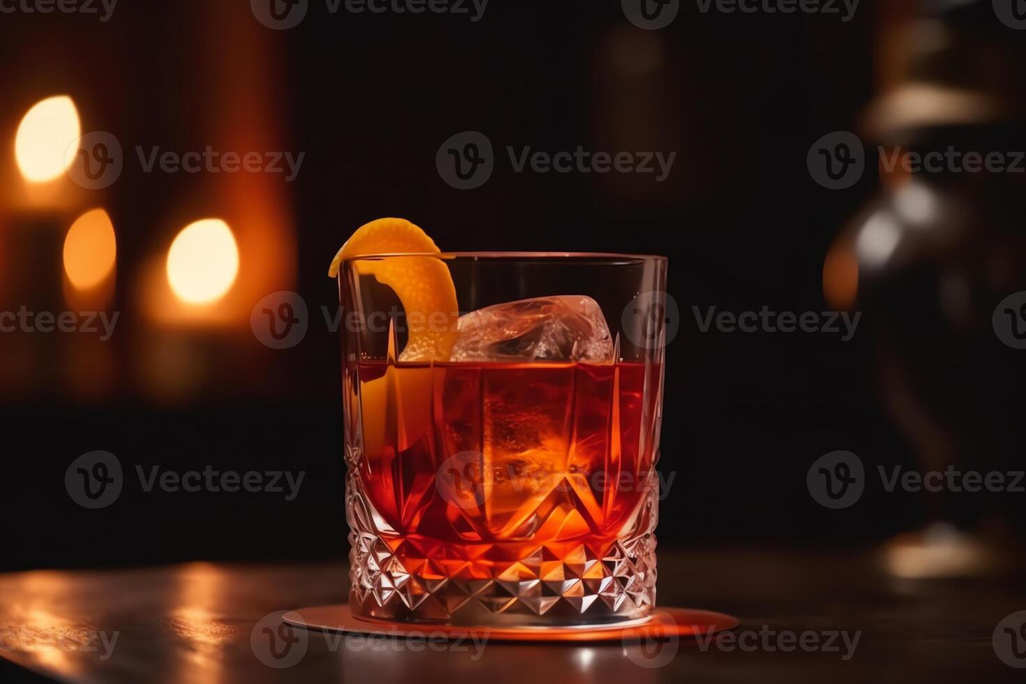 Close up of a negroni cocktail at vintage bar bokeh light. photo