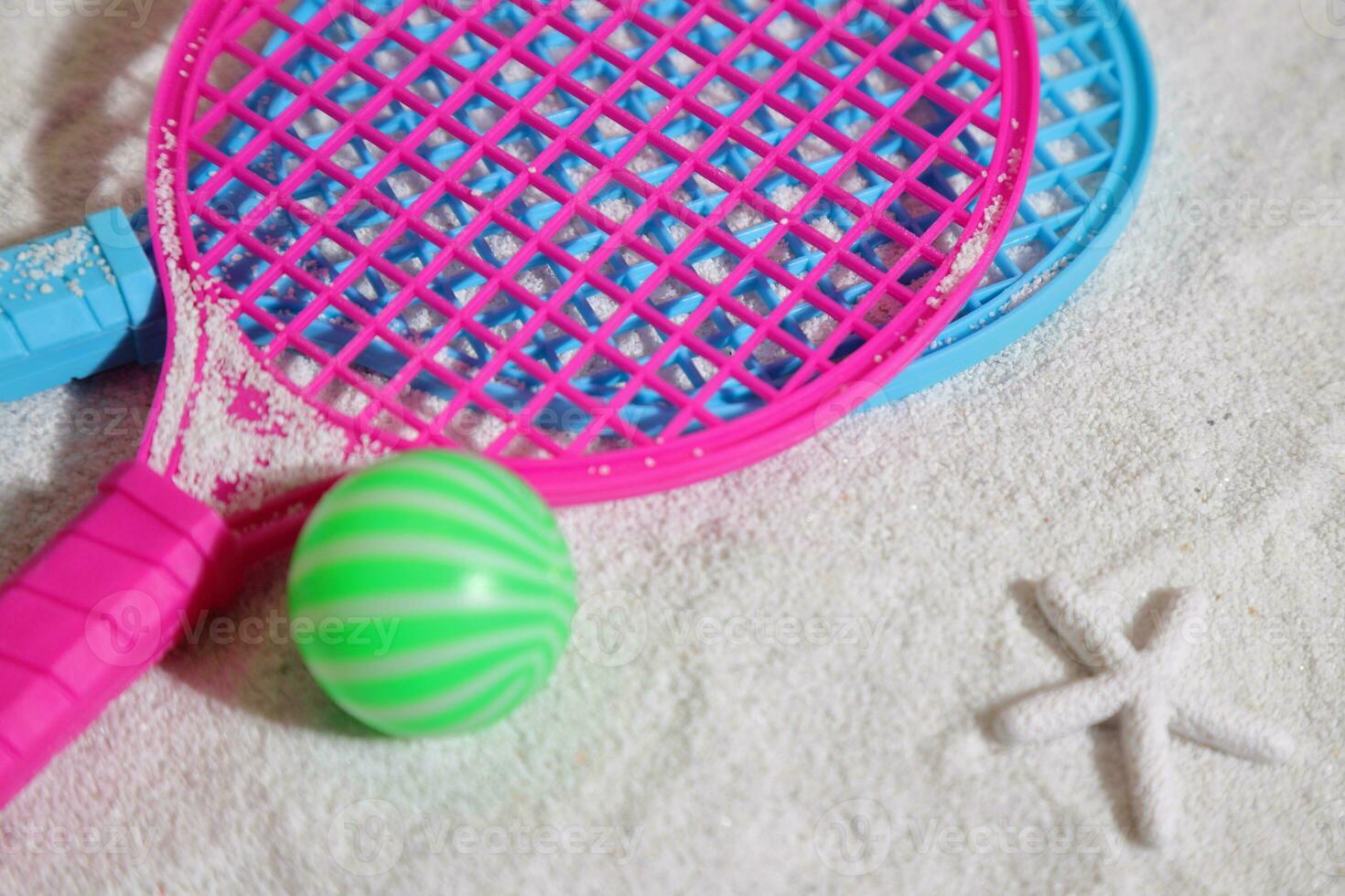 Beach tennis set on sand, summer sport activity photo