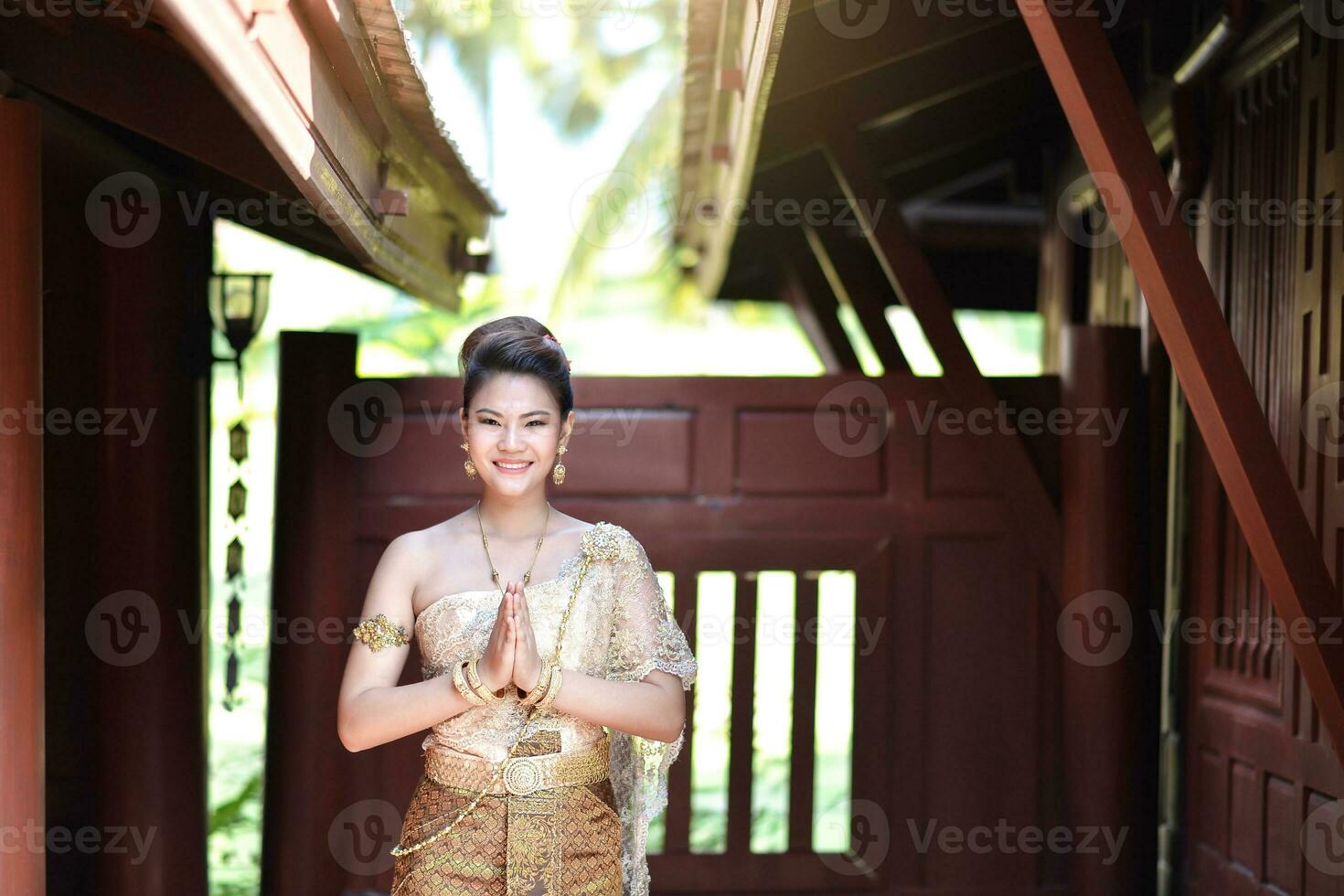 Beautiful Thai girl in Thai traditional costume photo